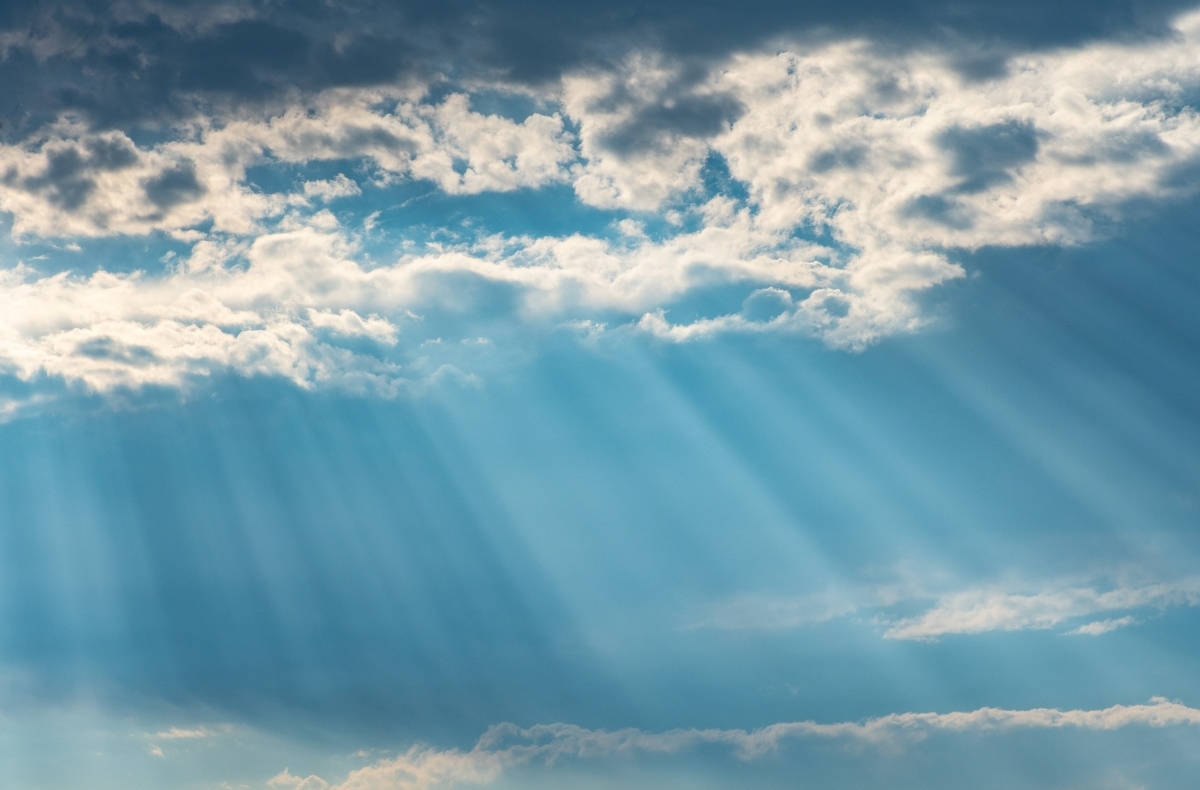 Sunlight streams through clouds