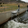 Water flows through an irrigation canal with a turbine at Ralston Reservoir in Arvada Colo. on Thursday, April 13, 2023.