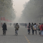 people walking in smoggy air