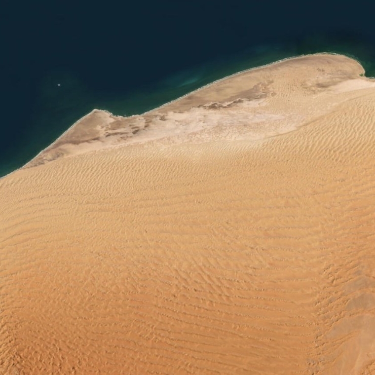 Complex patterns formed by linear and oblique dunes in the Namib Desert, Namibia.