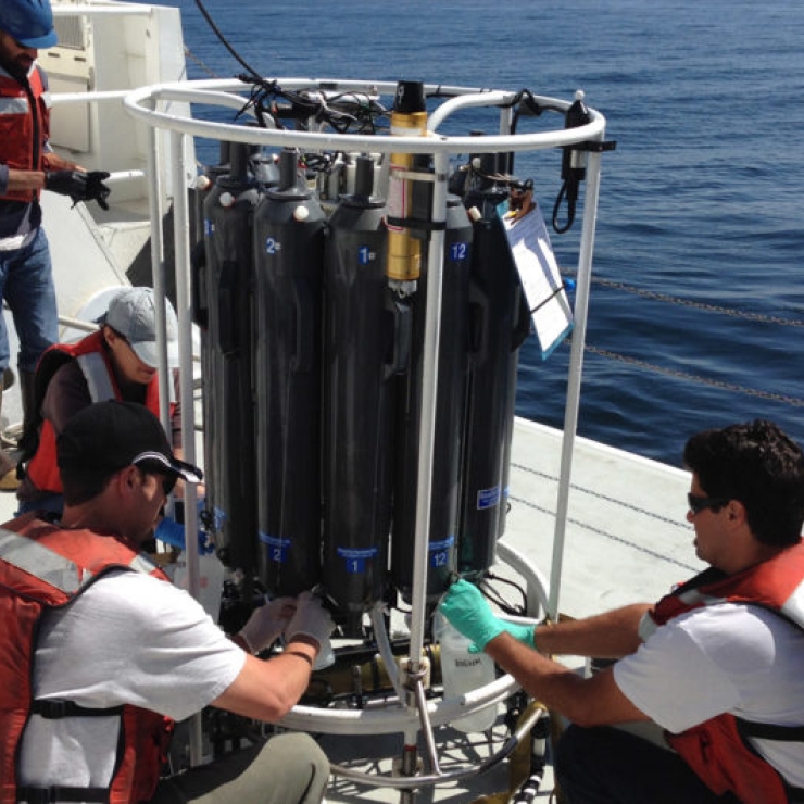 Team members from the Monterey Bay Aquarium Research Institute collect water from Monterey Bay for eDNA analysis.