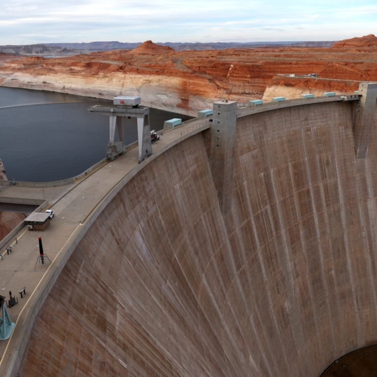 PAGE, ARIZONA - MARCH 27: A view of the Glen Canyon Dam at Lake Powell on March 27, 2022 in Page, Arizona. As severe drought grips parts of the Western United States, water levels at Lake Powell dropped to their lowest level since the lake was created by the damming the Colorado River in 1963. Lake Powell is currently at 25 percent of capacity, a historic low, and has also lost at least 7 percent of its total capacity. The Colorado River Basin connects Lake Powell and Lake Mead and supplies water to 40 mill