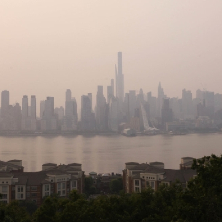 Smoke from Canadian wildfires shrouds the New York City skyline on June 7, 2023.