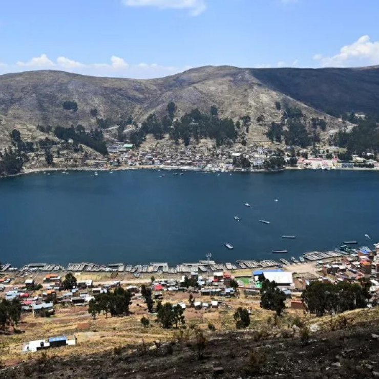 The towns of San Pablo and San Pedro at the Strait of Tiquina in Lake Titicaca, Bolivia, are shown on November 26, 2022. The lake's water levels last week fell below the drought warning stage.